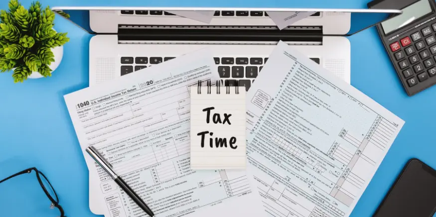 Tax Form 1040 on office desk