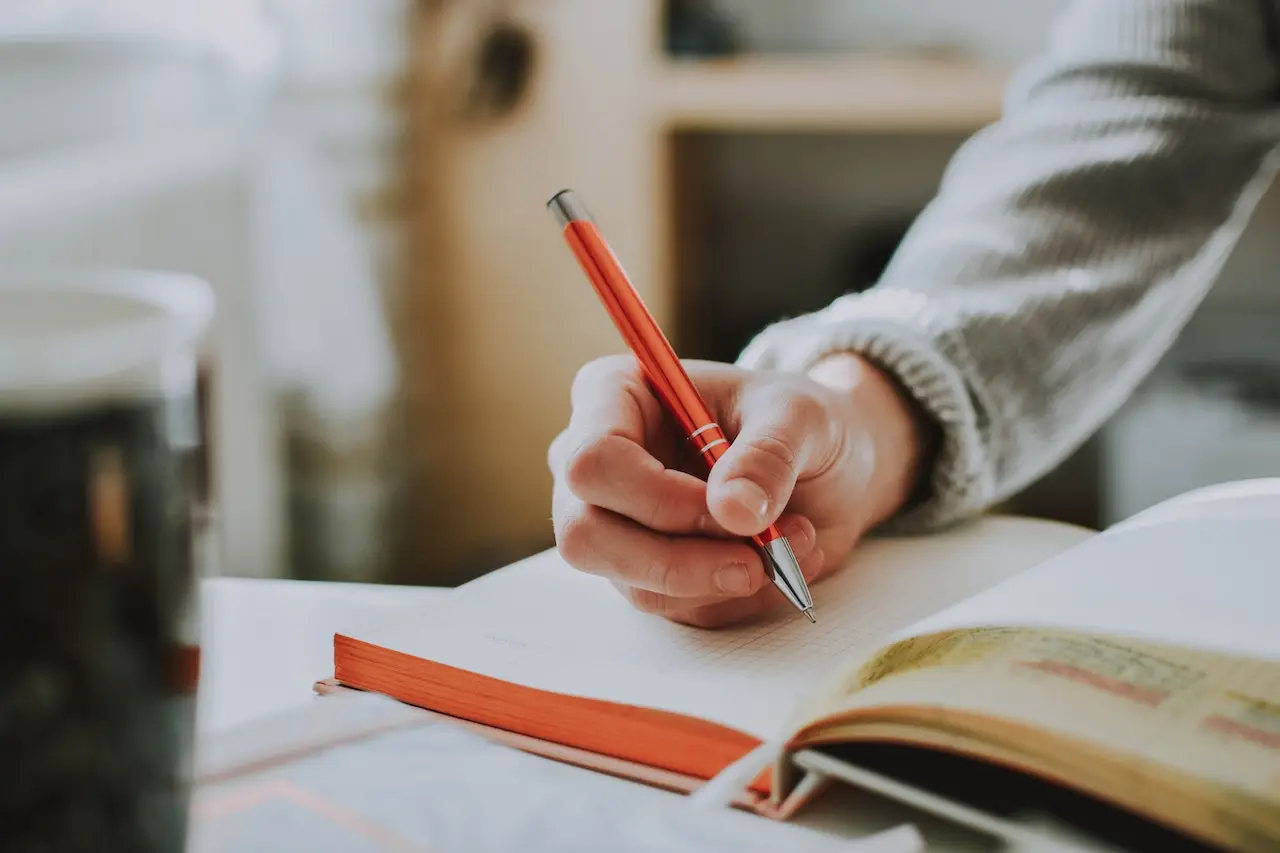 Woman making a hanwritten signature